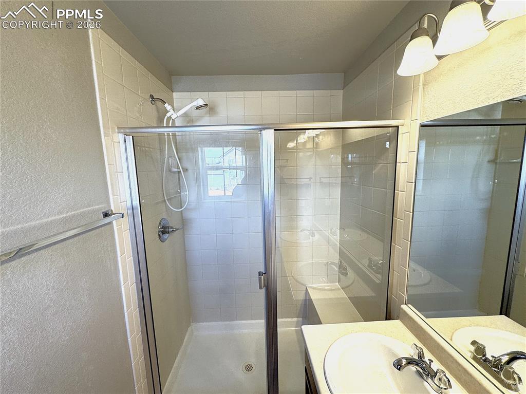 Glass Enclosed Shower in Primary Bathroom