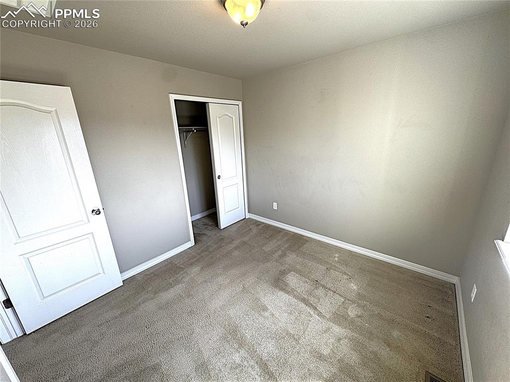 Upper-Level Bedroom 2 and Closet