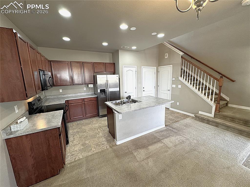 Kitchen has Lots of Cabinets & a Pantry