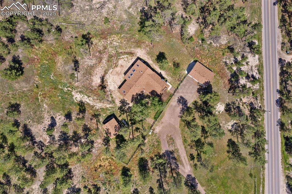 Showing driveway and all three sturctures, Shoup rd on the right