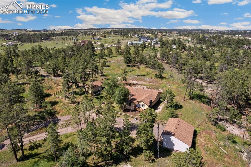 Facing N-NW, closer view of the front of the residence