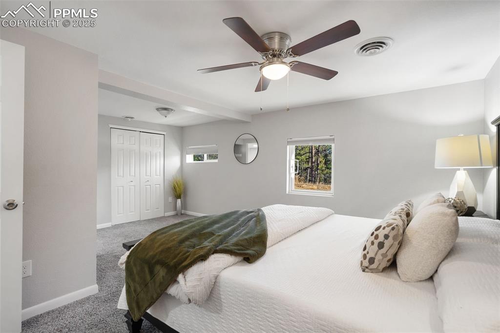 With seating area, extra closet, walk-in closet around to the left