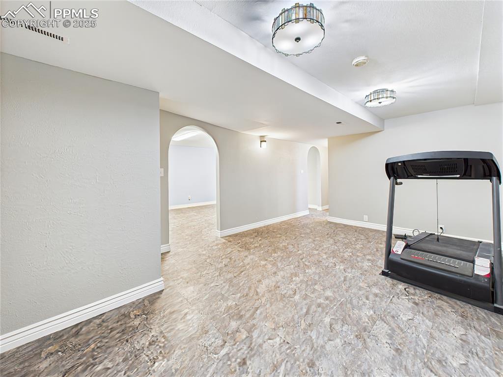 Basement Bonus/Flex Room – This additional lower-level flex space can serve as a home office, gym, or creative studio—complete with modern lighting and 2023 flooring.