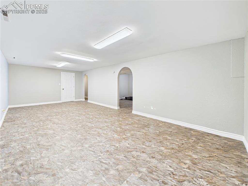 Basement Entertaining Area (Unfurnished) – Another look at the finished basement area, offering a flexible layout and bright neutral finishes to suit any lifestyle.
