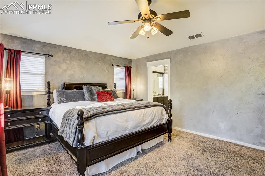 Enjoy an elevated primary suite complete with a door to the bathroom