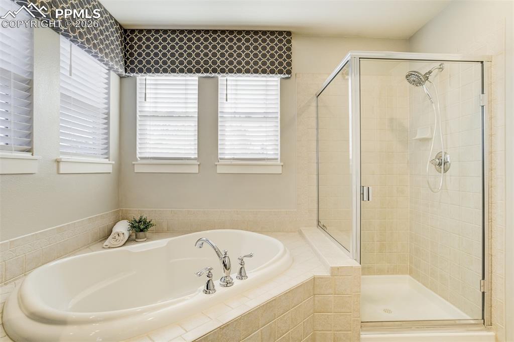 Escape to a large soaking tub a separate shower