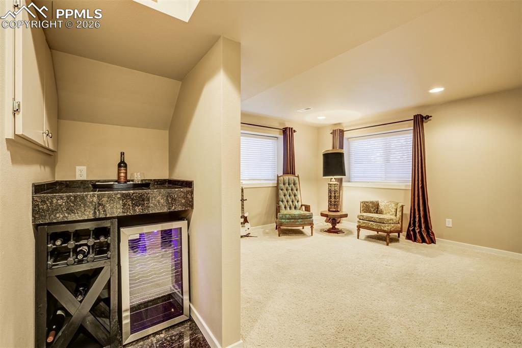 A beverage station make a nice touch to the other half of the basement