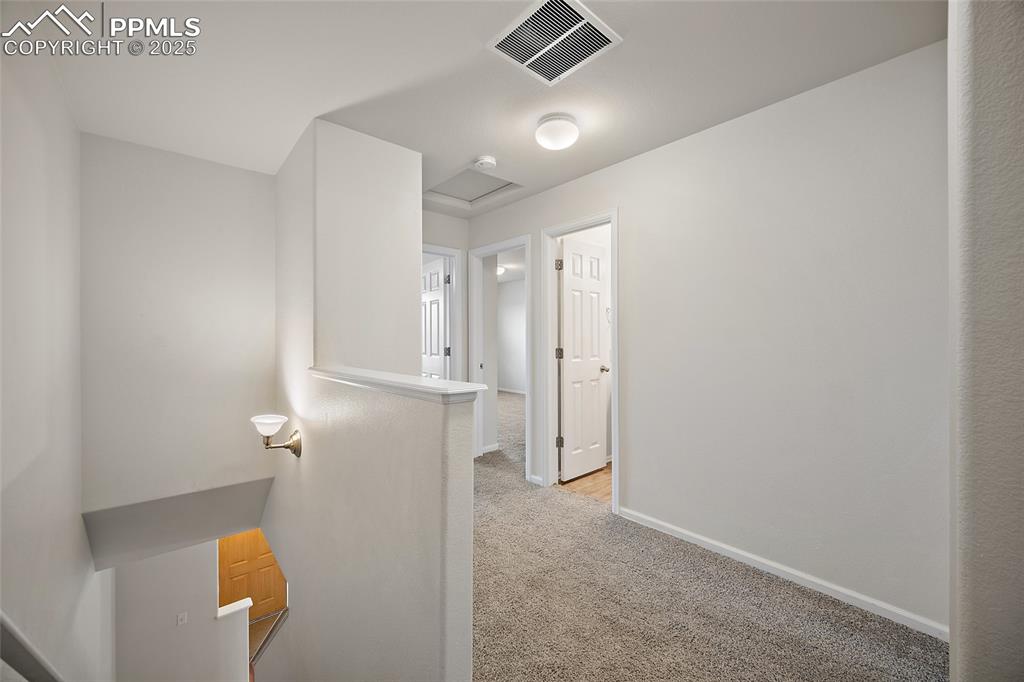 Wide hallway on the upper level.   