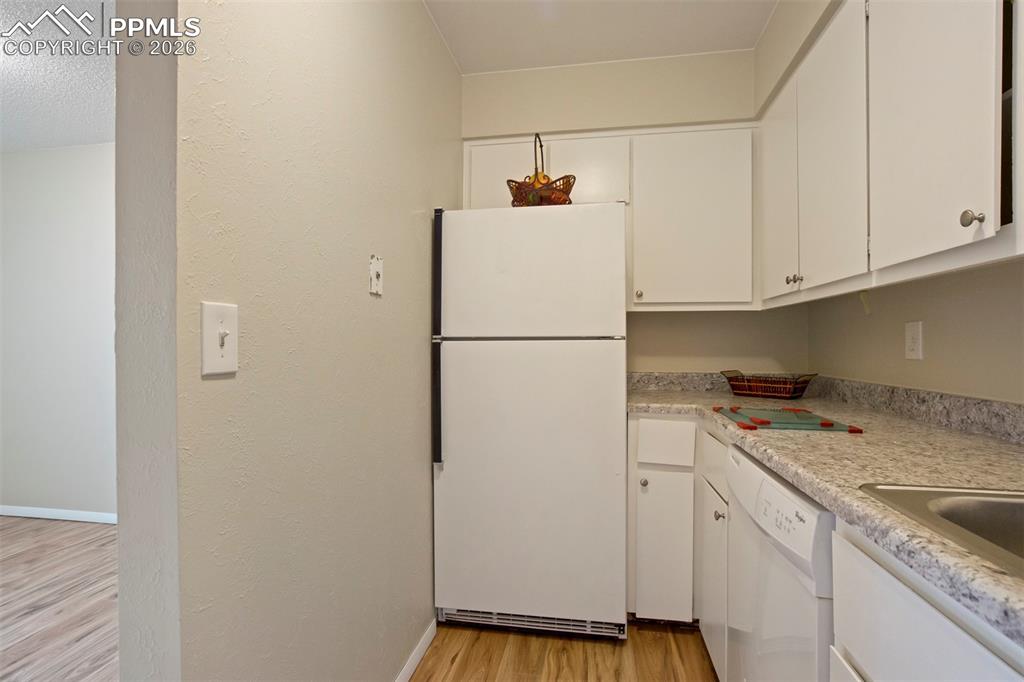 Refrigerator side of kitchen.