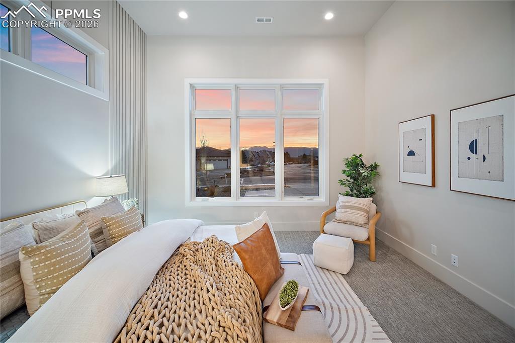 Guest suite with views of the mountains, walk-in closet and a private ensuite bathroom. 