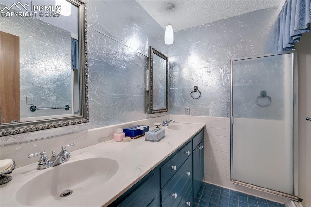 Hall bath with double vanity and shower