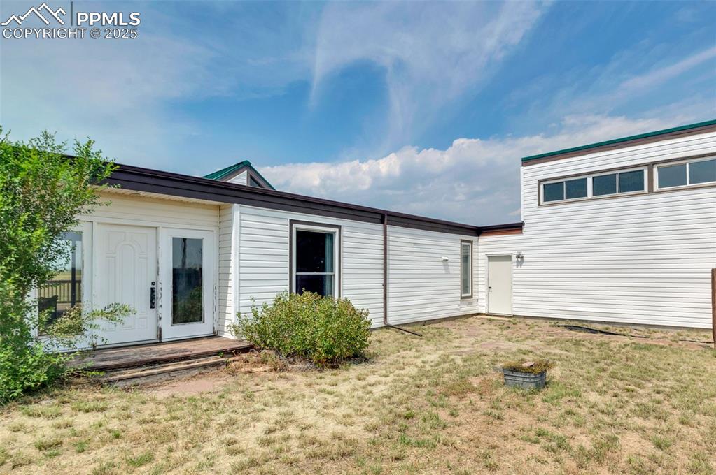 The artists loft windows overlook the front courtyard.