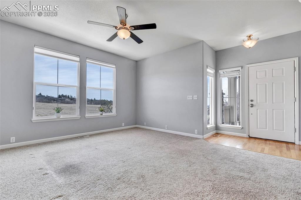 View of open space, lots of natural light, new paint