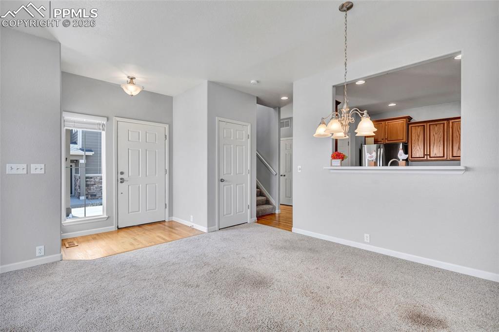 View of open space, lots of natural light, new paint