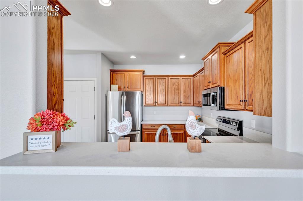 Breakfast bar looking into kitchen