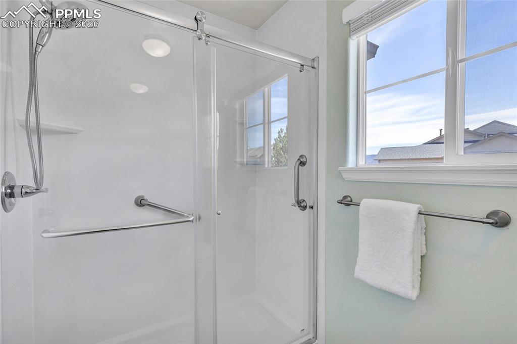 Dual vanity, remodeled shower, separate dessing and bathing areas
