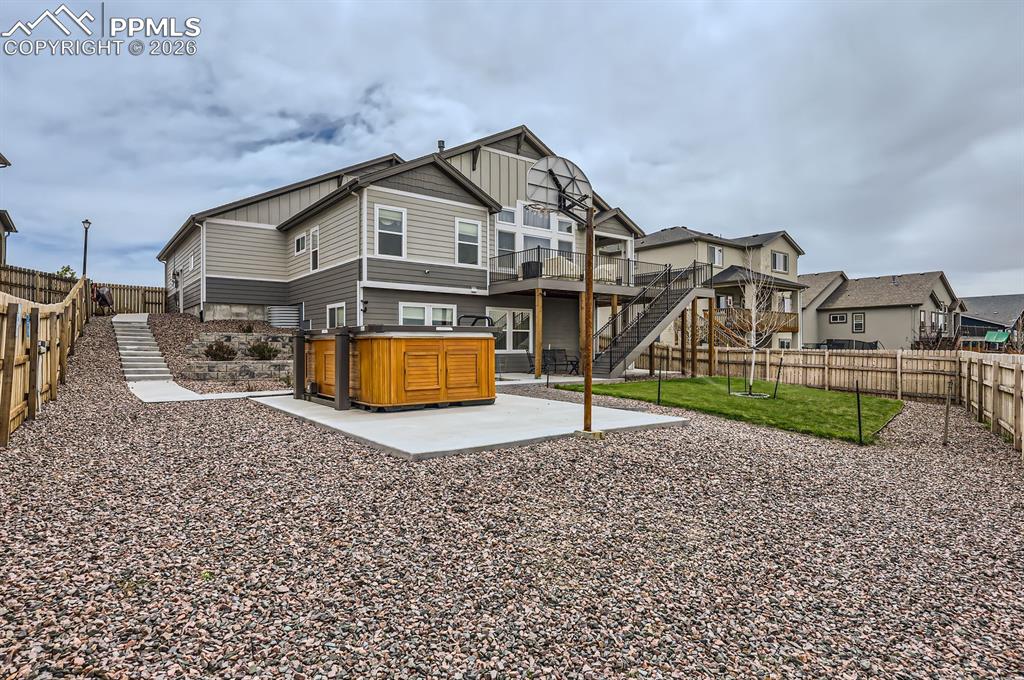 Back of house with Basketball Court