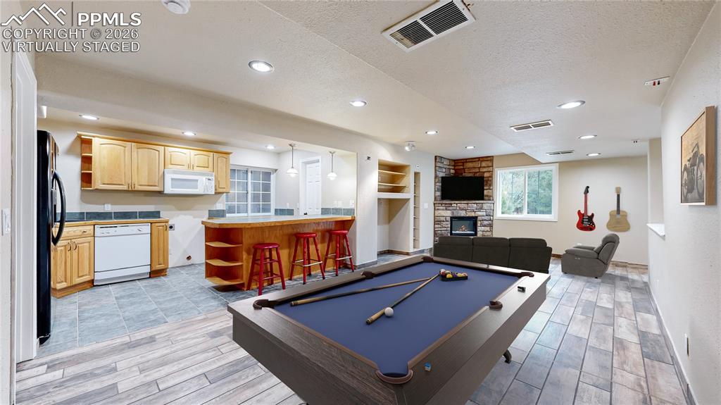Virtually Staged basement recreation area
