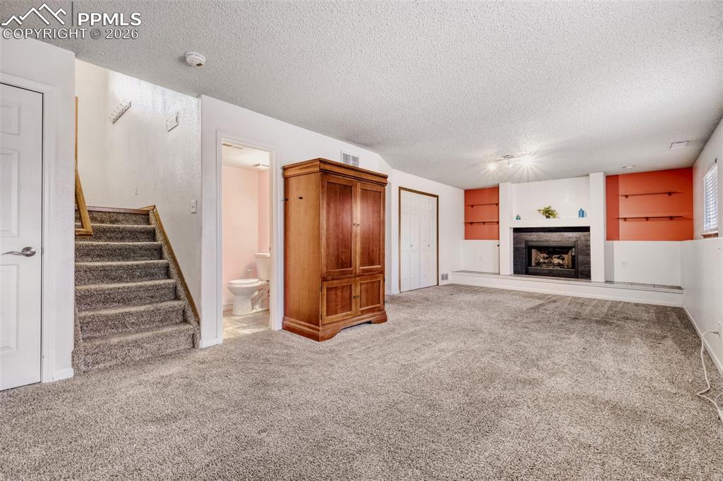 Lower Level Living Room - Cozy Fireplace! 