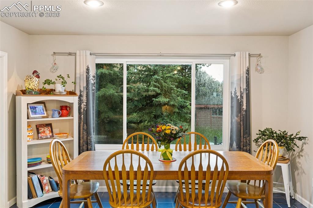 Eat-in kitchen/dining area (photo taken during rainstorm)