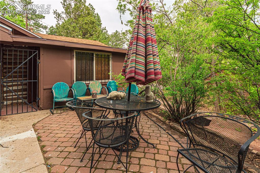 View of patio with outdoor dining space