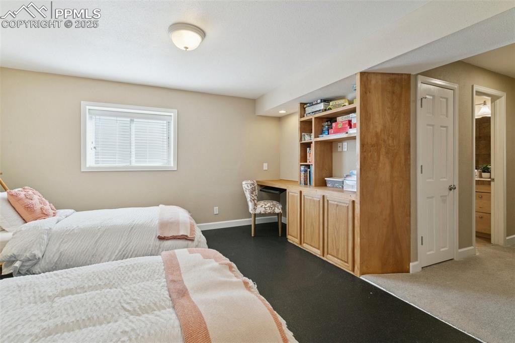 Another view of the Basement flex space w/built-ins!