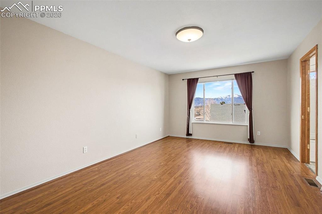 Primary bedroom with mountain view