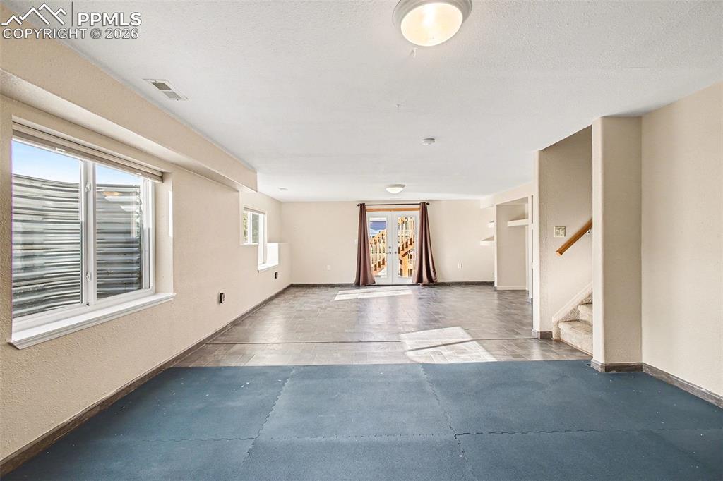 Downstairs living room with walkout basement