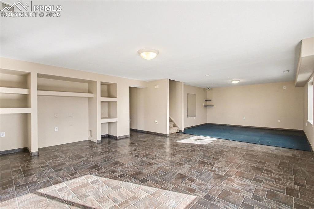 Downstairs living room with walkout basement