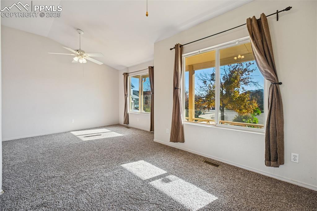 Secondary bedroom on the main level. Plenty of space for an office area.