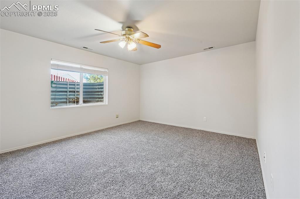 4th bedroom in the basement - new carpet and paint