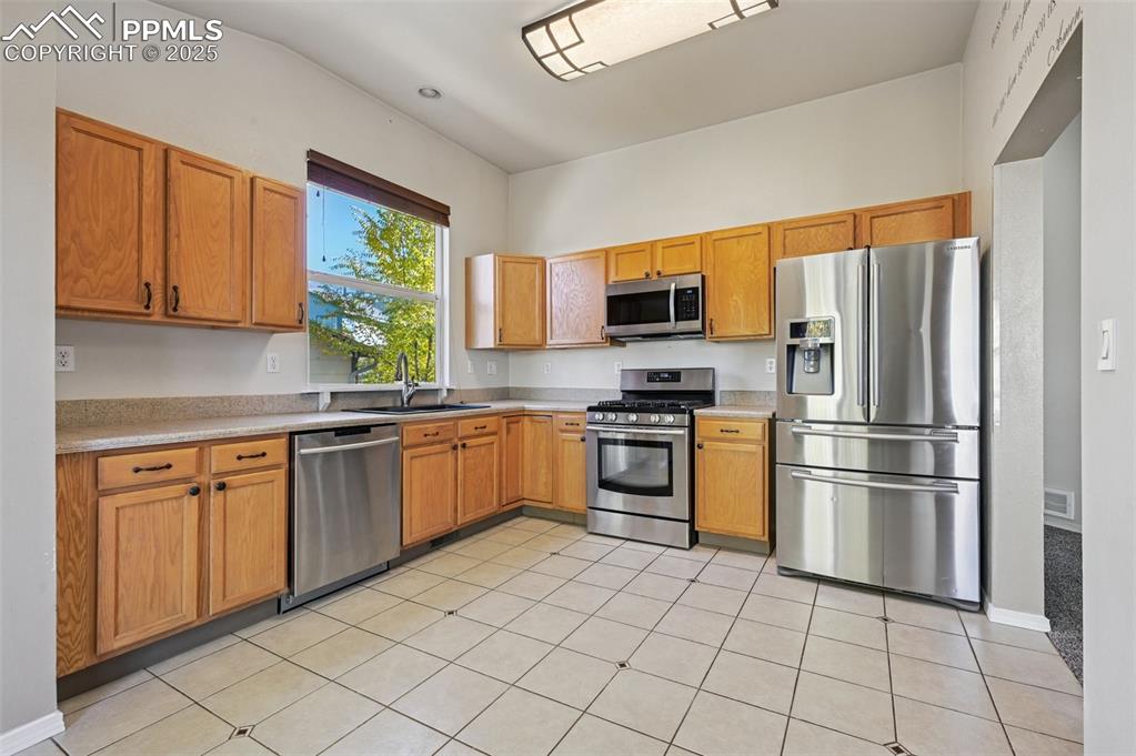 Kitchen with newer stainless steel appliances