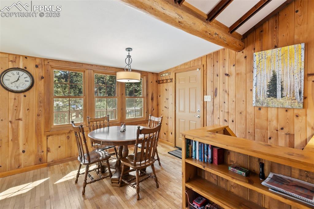 Dining area with built in bookshelf and gorgeous window views! 