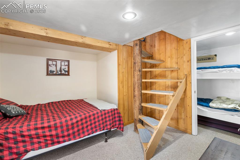 Unique winding stairs to the downstairs bedrooms