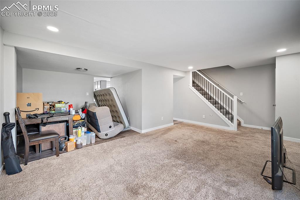 Playroom featuring carpet floors and recessed lighting
