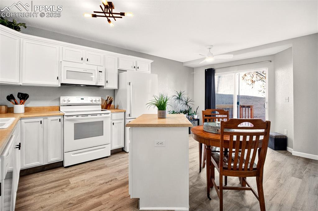Kitchen with luxury vinyl flooring and island