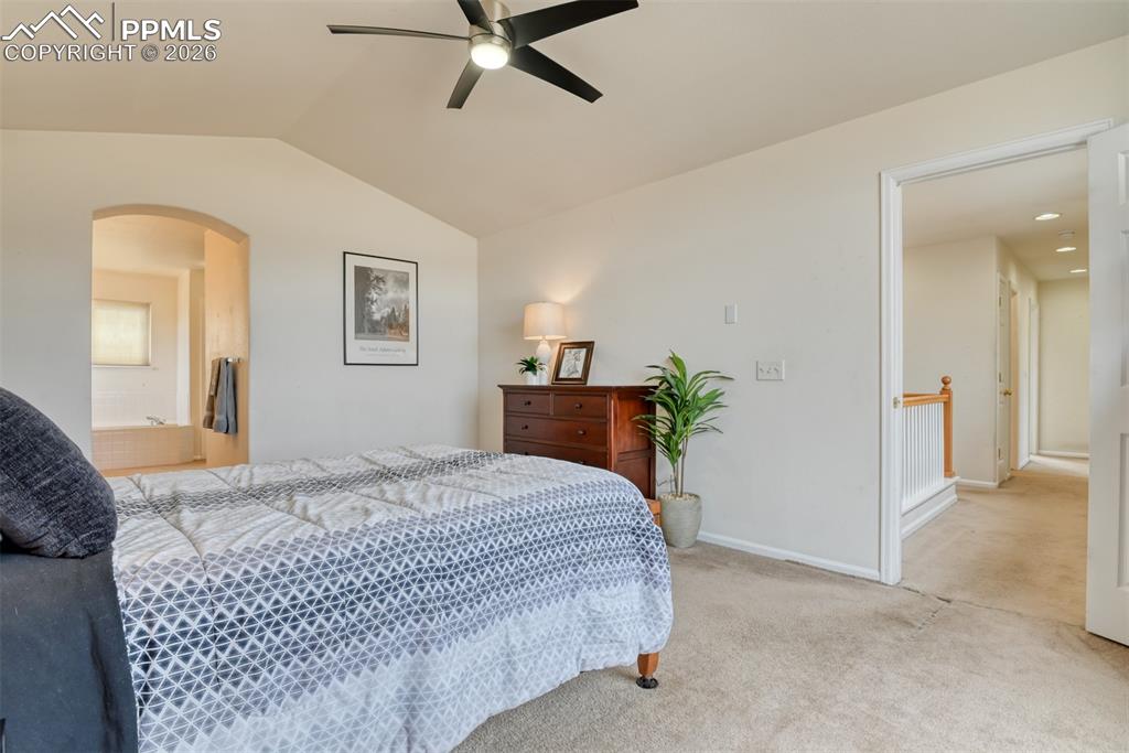 Primary bedroom is located at the opposite end of the hall from the other 3 bedrooms and connected to the 5 piece primary bathroom.