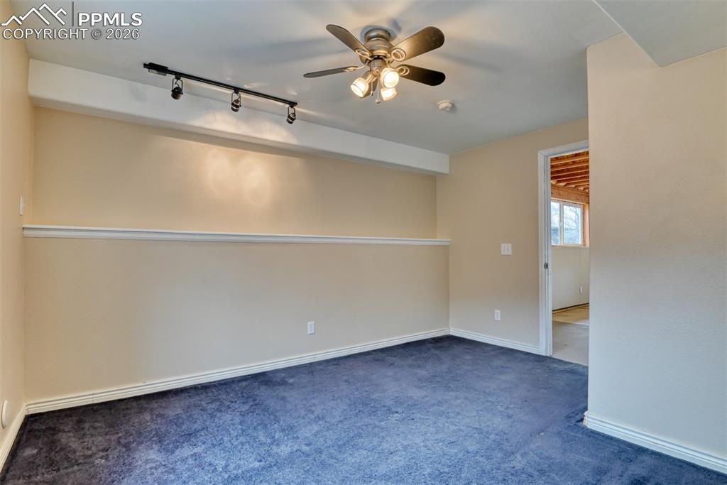 Another view of bedroom 5- with extra track lighting. 