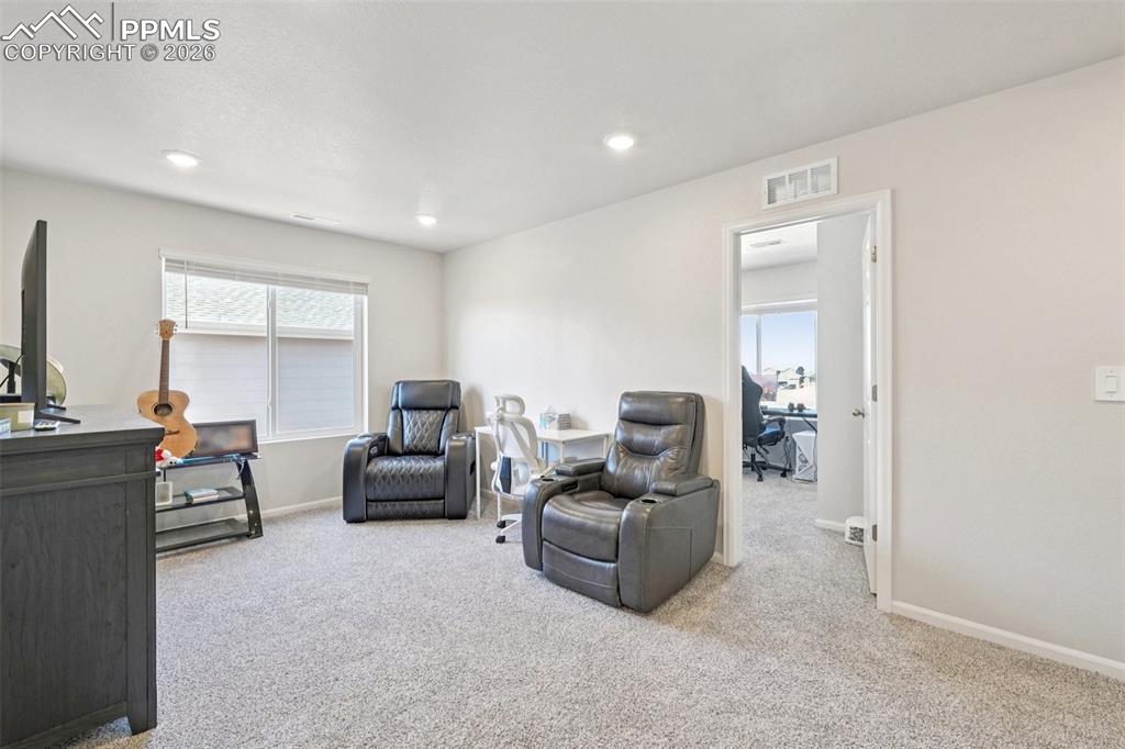 Upstairs family room is a great blank space for your needs- loft, playroom, office...