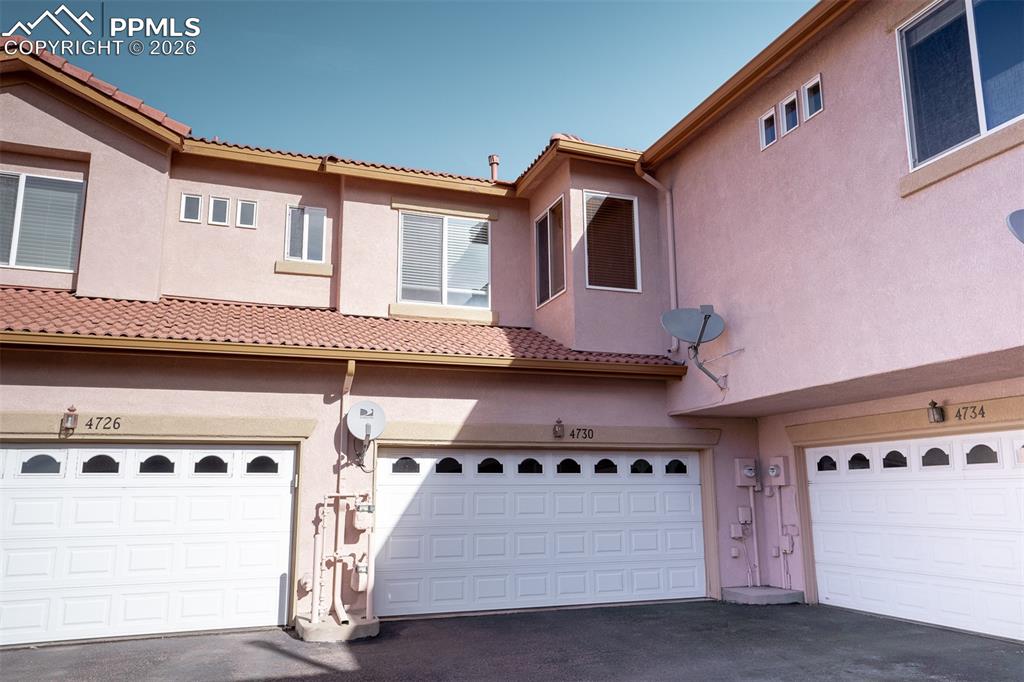 Middle of the 3 doors is the homes garage