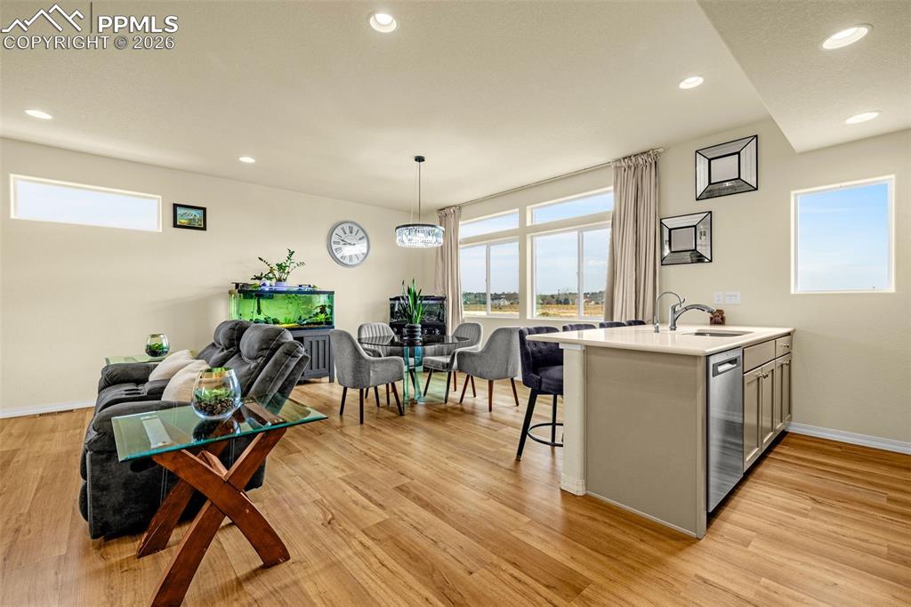Open Kitchen looking out to the family room and dining area