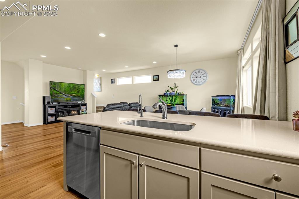 Open Kitchen looking out to the family room and dining area