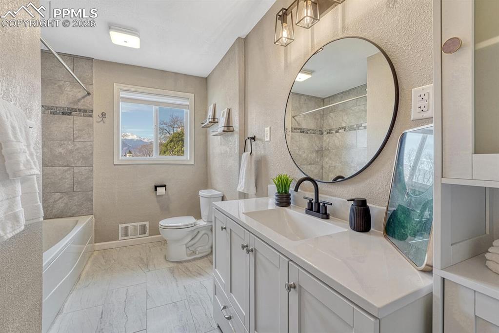 Upgraded main level full bath. 