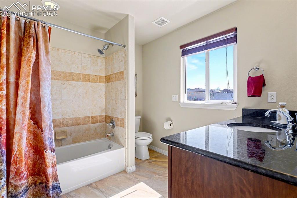 Upper level full bathroom serves the 3 bedrooms