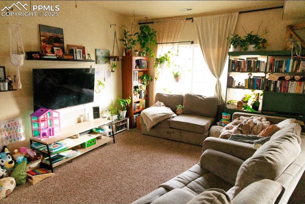 View of carpeted living room