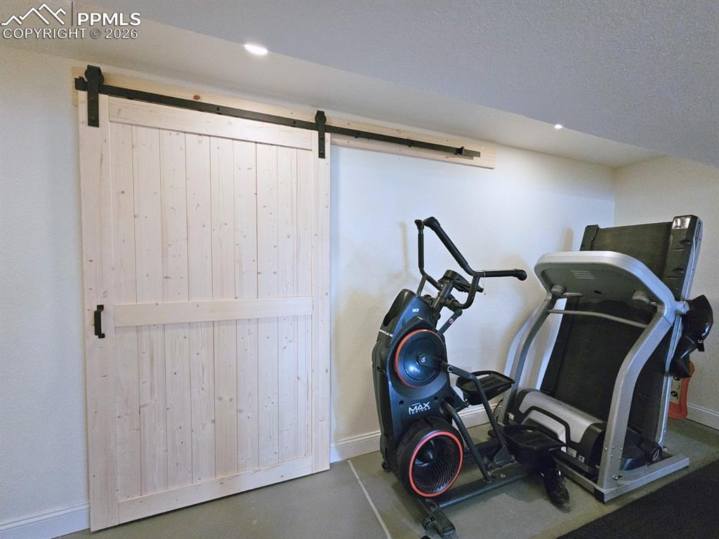 Framhouse Door to Storage w/ 4 Lockers and Pass-Through to water room