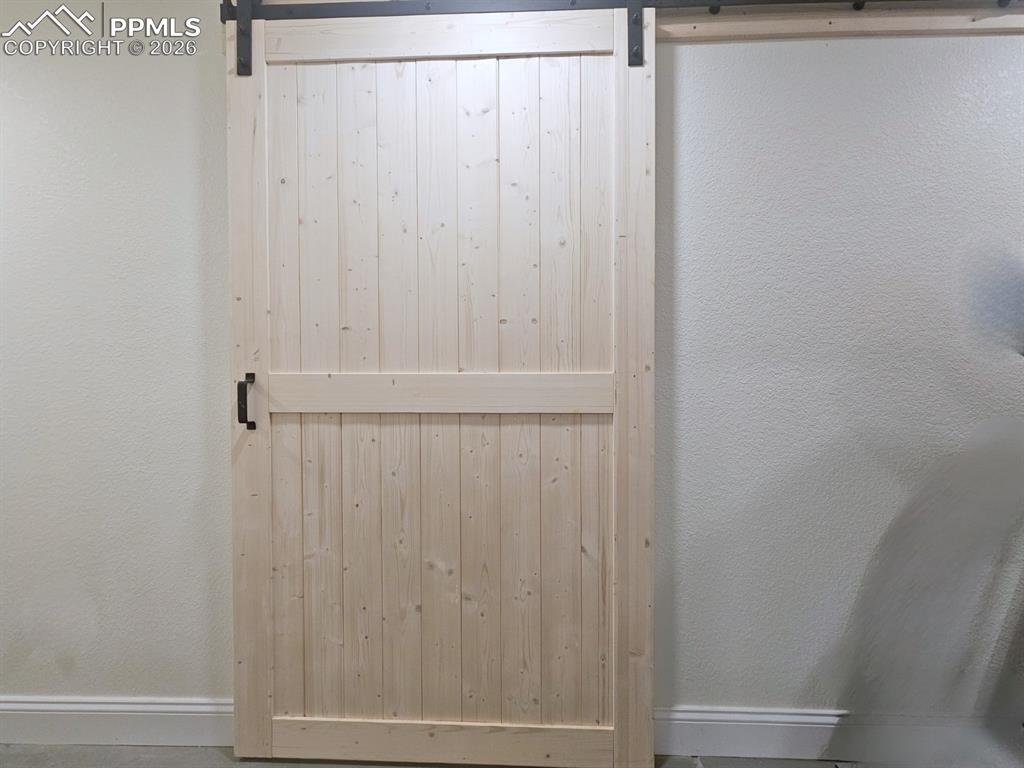 a 16 x 6 Closet with Framhouse Door to Walk-In Closet - Bench and Sump Pump room