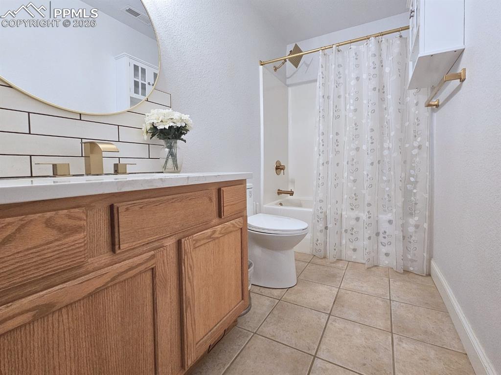 Large Bathroom with Custom finishes with Backsplash, Quartx Countertops, and Cabinets, New Procelain