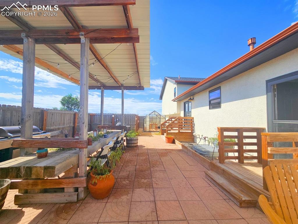 Copper Fans, Gutter, Edging with Cedar wood Landing - walk through to greenhouse