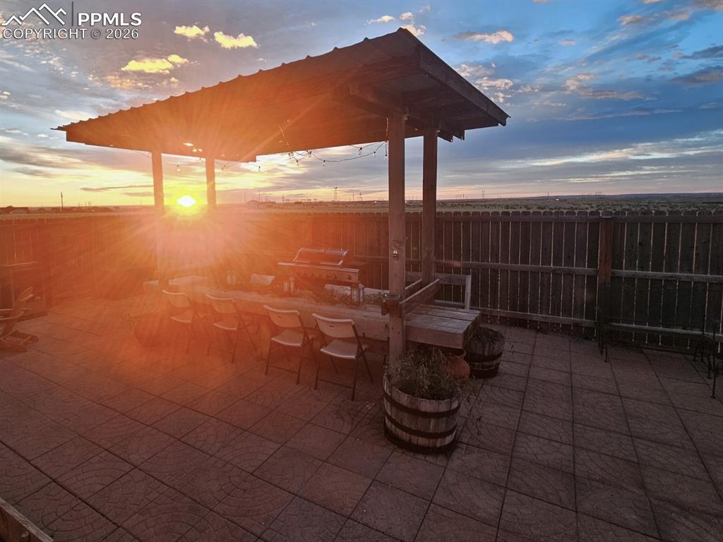 Sunise to the East with Natural Light at French Doors to the kitchen